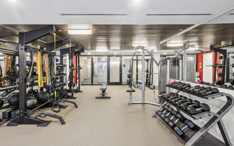 fitness center with exercise equipment